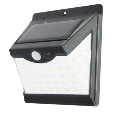 China Warehouse CAN Manufacture Dimming Built-in ABS Outdoor Motion Sensor Led Solar Garden Wall Light Warm White for sale