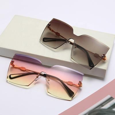 China Rimless Glass One-Piece Clothing Glass Sun Glasses Vintage Unique Square Oversized Sunglasses Fashion Big Sunglasses for sale