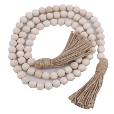 China Modern Interior Decorations Wood Beads Garland Rustic Decor Bedroom Wall Decorations Farmhouse Ornament Woven Wall Hanging for sale