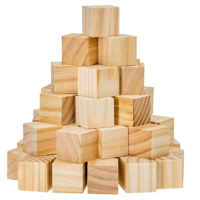 China Eco-friendly material set of 50 unfinished wooden block cubes 1.5 inch natural wooden blocks for arts and crafts for sale