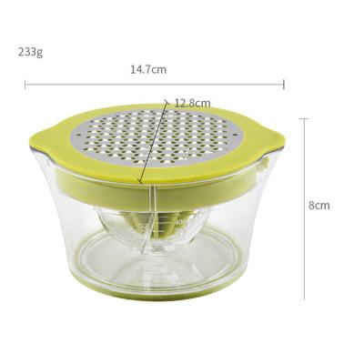 China Stocked 4 in 1 Manual Juicer Ginger Juice Chopper Lemon Juicer Measuring Cup Plastic Juicer for sale