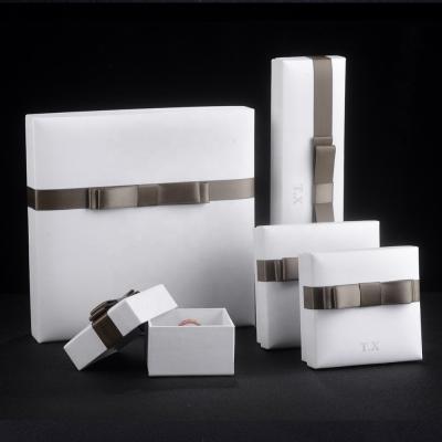 China 2020 Hot Sale Gift Cardboard Jewelry Boxes Paper Jewelry Gift Packaging Ring Box With Ribbon for sale