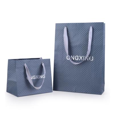 China 2020 Materials Tote Bag Blue Luxury Jewelry Recycled Durable Special Paper Packaging Bag With Ribbon for sale