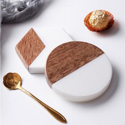 China Sustainable New Style Household Dining Table Marble Splicing Coffee Wood Coasters Round Shape Coasters for sale