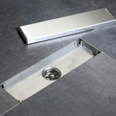 China Modern cheap stainless steel 80*580 mm auto-end floor drain shower for sale