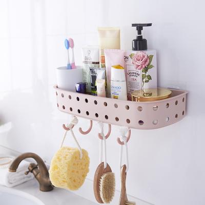 China Sustainable Adhesive Wall Mounted Sundries Storage Plastic Bathroom Kitchen Hanging Shelf for sale