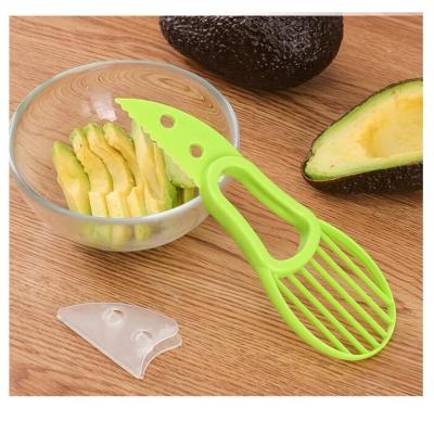 China Orealmi Kitchen Viable Peel Cutter Magic Fruit Tool 3 In 1 Pitaya Kiwi Avocado Slicer for sale