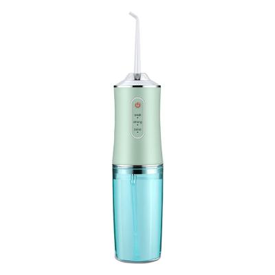 China Simple Modern Portable Electric Household Device Dental Flosser Tooth Punch Waterproof Rinse Electric Cleaning Oral Irrigation for sale