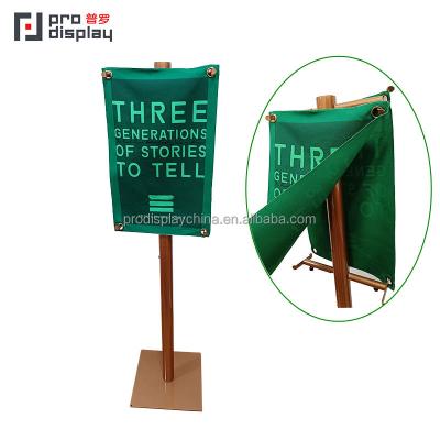 China Powder Coated Metal Customized Green Canvas OEM Printed Floor Standing Display Stand for sale