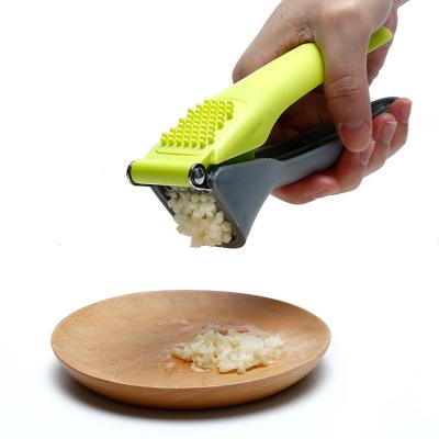 China OEM ODM Garlic And Ginger Mincer Green Kitchen Garlic Press for sale