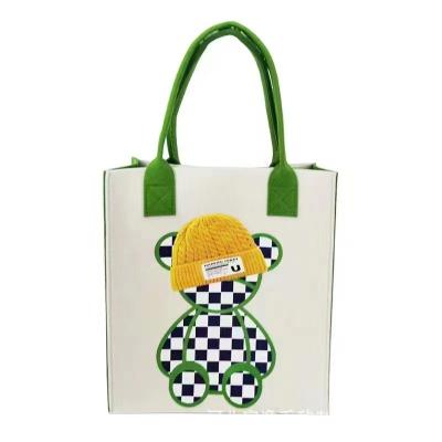 China Waterproof Fashionable Waterproof Printed Felt Tote Handbag Lady's Stylish Square Vertical Student Work Bag with Cartoon Print New Style for sale