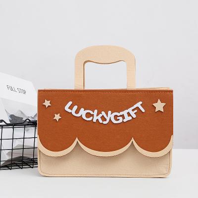 China Fashion Hot Selling Custom Logo Reusable Felt Grocery Tote Shopping Bag Fashion Style Basket Felt Gift Bag for sale