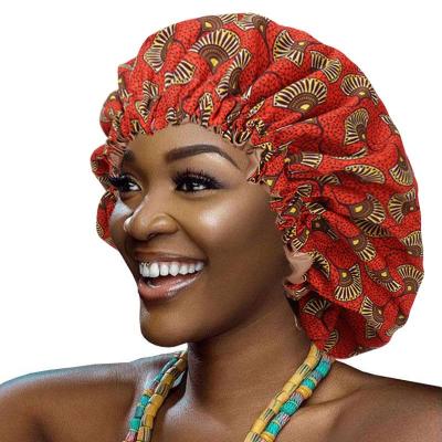 China Good Quality Comfy Elastic African Printed Flower Sleep Hats Shower Cap Satin Hood For Graceful Beauty Women for sale