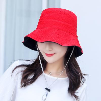 China Fashion and Summer Bucket Online Wholesale Fashion Sunscreen Beach Spring Windproof Luxury Wide Brim Fisherman Hat For Woman for sale