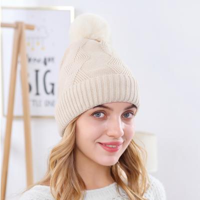 China JOINT New Women's Solid Diamond Warm Plush Knitted Imitation Wool Hat for sale