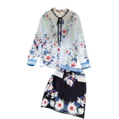 China Chic Elegant QUICK DRY Women Fall Blue Two Piece Floral Skirt Set Lace Up Long Neck Sleeve Skirt And Blouse Sets for sale