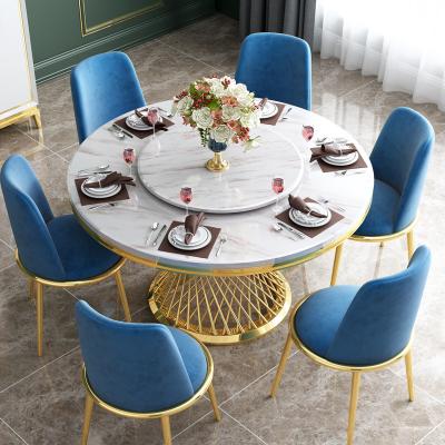 China (Other)Adjustable luxury home furniture gold round marble dining table set 6 chairs with stainless steel base for sale