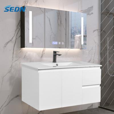 China Modern Bevel-Handle Finger Pull Style Melamine Particleboard Wall Hang White Single Sink Bathroom Vanity Cabinets for sale