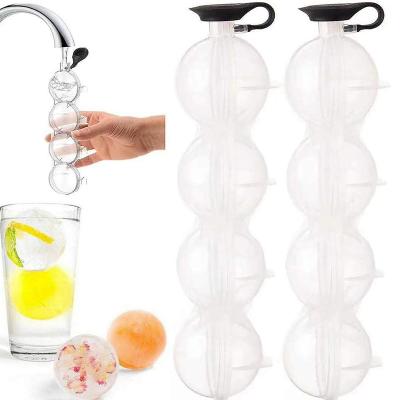 China Viable Homemade Plastic Whiskey DIY 4 Hole Round Ball Ice Hockey Puck Mold Ice Cube Tray Ice Cream Maker for sale