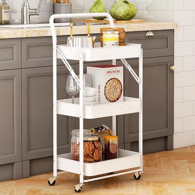 China Three-Layer Sustainable Folding Mobile Rolling Fruit And Vegetable Basket With Wheels Trolley Kitchen Storage Serving Rack for sale