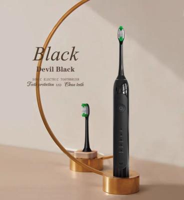 China Battery powered Kangyu Waterproof Electric Toothbrush for Kids Black Electric Toothbrush for sale