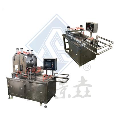 China Depositing Semi-Automatic Manual Colored Hard Candy Molding Equipment Production Line for sale