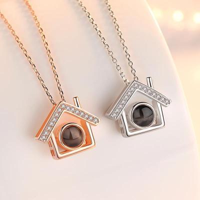 China 100 Valentine's Day Languages ​​Brass Necklace XIXIA House Shape Projection Necklace Fashion Custom Jewelry Women I Love You for sale