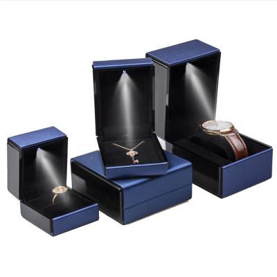 China Custom Ring Luxury Ring Jade Pendant Packaging Led Light Leather Jewelry Ring Box Led Light Jewelry Box Packaging for sale