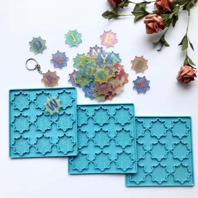 China 0162 DIY Mirror Letter Viable Crystal Epoxy Mandala Flower Shaped Key Chain Pendant Craft Silicone Mold Resin Craft for sale