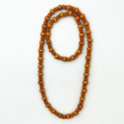 China Hot Sale Vintage Cheap Handmade Wooden Stock Beads Elastic Bracelet&Necklace Set for sale