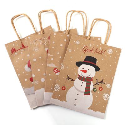 China Disposable New Year Favors Navidad Home Decor Christmas Tree Gift Bags Christmas Candy Bag Paper Bag With Handle for sale