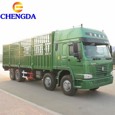 China Sinotruk Price Howo 6x4 8x4 12 Wheel Barrier Cargo Trucks In Ghana 10350x2496x3718mm for sale