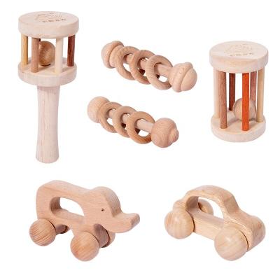 China Custom Wooden Musical Baby Rattle Toys with Teether Newborn Infant Teether Soothing Grabbing Toy Sets Musical Sensory for 0 12 Months for sale