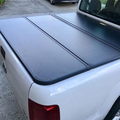 China Tailbox Custom-Fit Pickup Truck Tonneau Covers For Nissan Navara NP300 Aluminum Triple Rear Box Cover Canopy Truck Bed Protector for sale