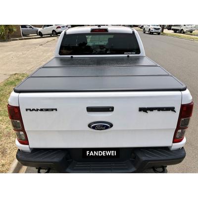 China Tailbox Customized Pickup Truck Tonneau Covers For Ford Ranger Raptor Aluminum Rear Box Lid Triple Canopy Let You Be Real Truck Hero for sale