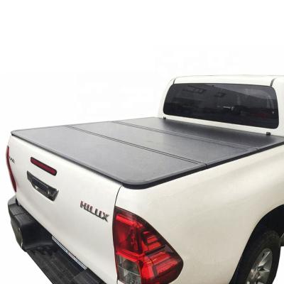 China Tailbox Customize Exact Sizes Pickup Truck Tonneau Covers For Toyota Hilux Aluminum Honeycomb Canopy Triple Truck Bed Protector for sale