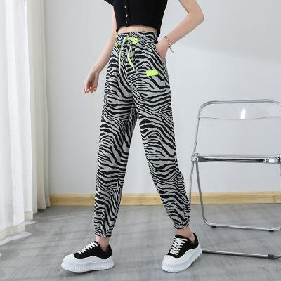 China OEM QUICK DRY Women's Black And White Zebra Mesh Flare Trousers All Over Zebra Print Animal Print See Leggings Flare Sweatpants for sale