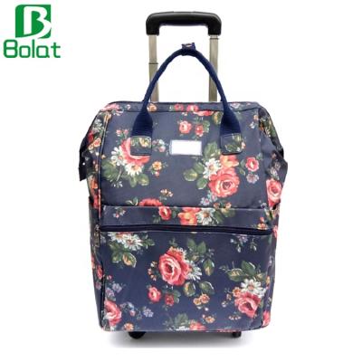 China Flora Print Canvas Trolley Tote Bag Carry-on Luggage Large Capacity Travel On The Wheel Rolling Duffle Bag for sale