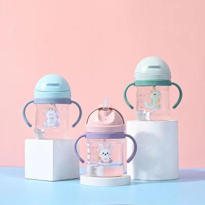 China 100% Eco-Friendly/Non-toxi Kids Drink Feeding Training Baby Sippy Cups Leakproof Bpa PP Free Handle Baby Drinking Bottle Sippy Wholesale With Straw for sale