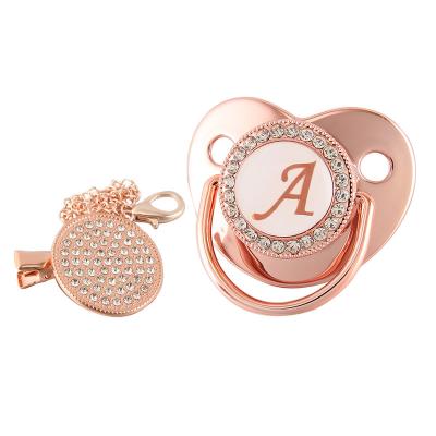 China BPA Free Silicone Baby Nipple Teat Rose Gold Diamond 26 Letters Gold Custom Pacifier With Bpa Free Silicone Infant Nipple for sale