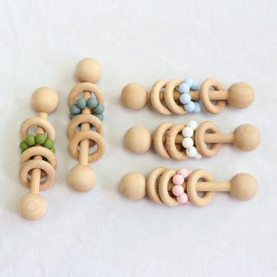 China Soft Natural Beech Wooden Rattle Toy Baby Silicone Teether Wooden Baby Rattle Montessori Toys for sale