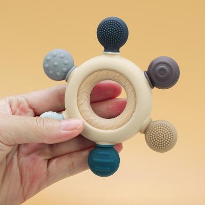 China 100% Eco-Friendly/Eco-Friendly Silicone Wooden Wooden Baby Round Teether Non-toxi Ring Silicone Baby Teether Food Grade Sensory Toys for sale