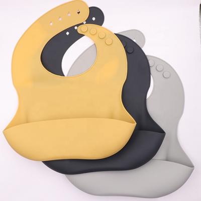 China Suitable Sustainable Bibs Adjustable Waterproof Silicone Girls and Boys Bib For Baby for sale