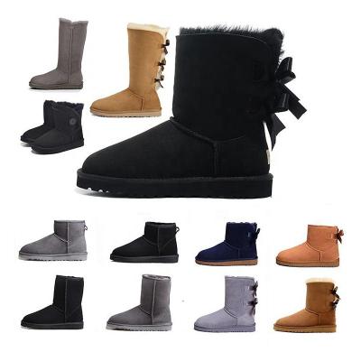 China Fashion Trend Wholesale Australia Winter Classic Women's Fur Uggly Snow Boots Women's Bowtie Short Fluff Boots Women's Shoes Ugghly Boots for sale