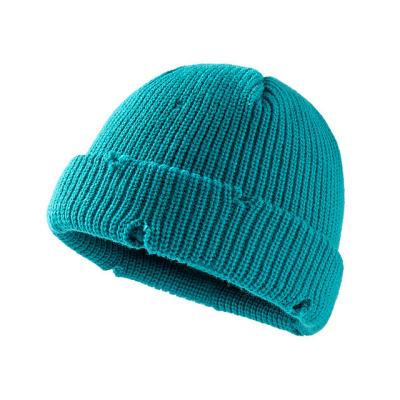 China JOINT Broken Hole Hip Hop Bone Skullies Knitted Beanie Hat Winter Soft Warm Hats Big With Custom Logo for sale