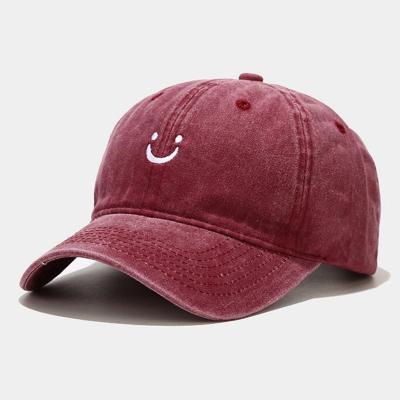 China JOINT face embroidery smile casual dad hat cotton washed distressed baseball cap fashion sports than unsex hat for sale