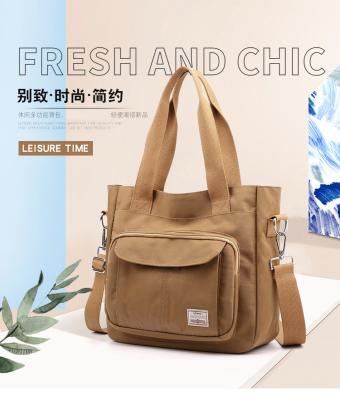 China 2024 NUEVO BOLSO ATOMOSFÉRICO DE MAMÁ DE GRAN Capacidad BOLSO de hombro único MANO CROSSBODY BOLSO de tela de nylon hombro de mujer en venta