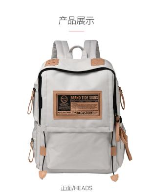 China MALE BACKPACK FEMALE COLLEGE STUDENTS SIMPLE DESIGN SENSE NICHE COMPUTER BAG SCHOOLBAG for sale