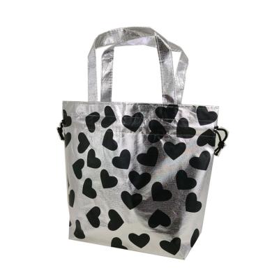 China 100% eco-friendly non woven custom made silver heart logo printing string drawstring bag factory price for sale