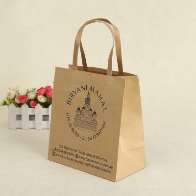 China Recyclable Printed Brown Grocery Kraft Paper Bag With Paper Handles for sale